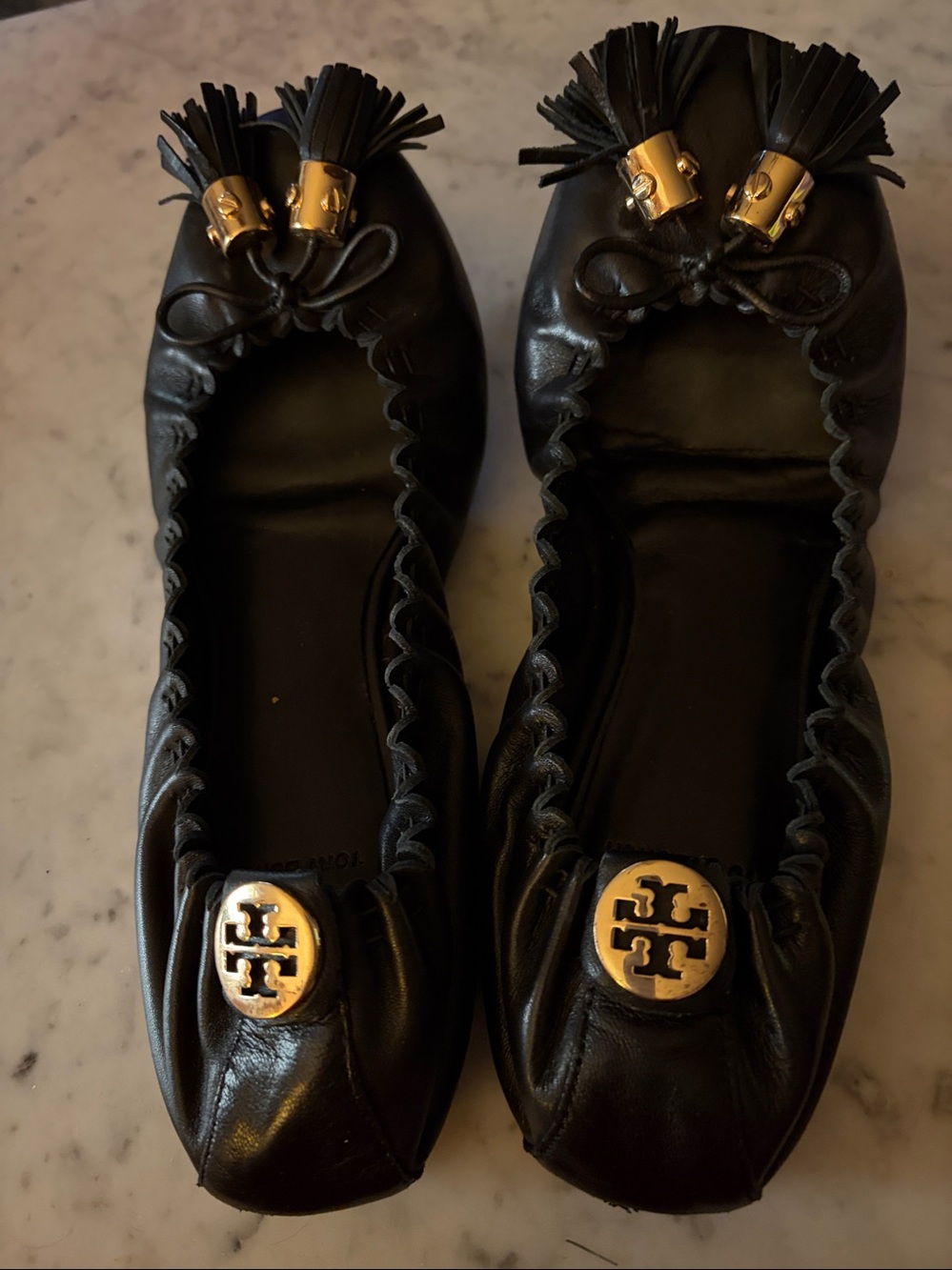 Tory Burch Black Leather Tassel  Slip on Ballet Flats with Gold Logo MYRA
Size 7